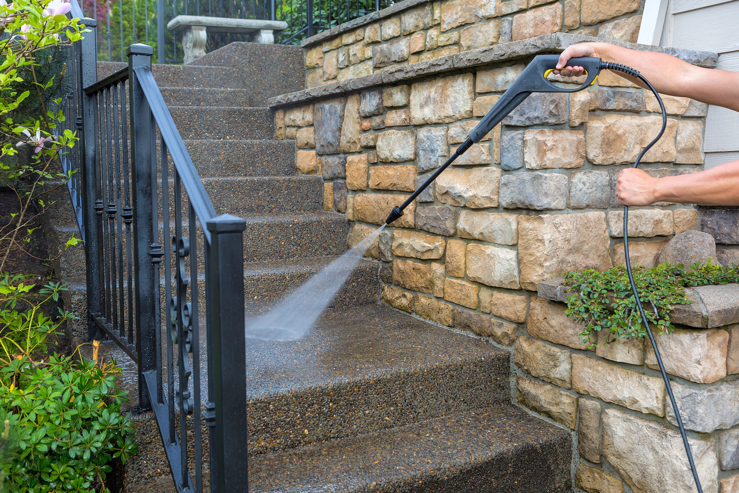 pressure power washing the front entrance stair steps
